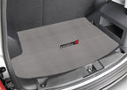 Gray car trunk mat with a logo on a vehicle's open trunk