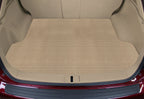 Car trunk with a beige cargo mat inside