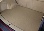 Car trunk with a beige cargo mat