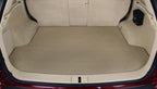 Car trunk with a beige cargo mat