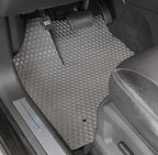 Gray car floor mat in a vehicle interior