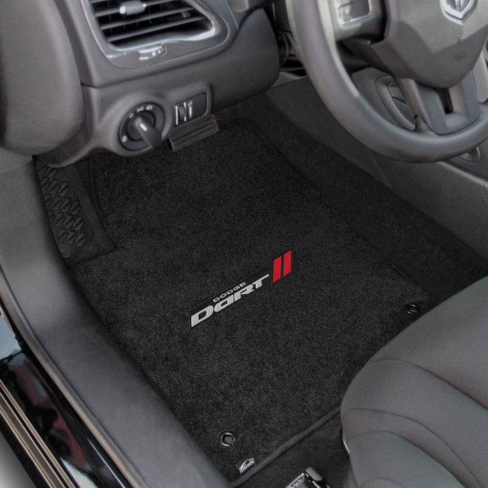 Car interior with black floor mats featuring 'Dodge Dart' logo.