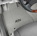 Gray car floor mat with 'MBZ' branding on a vehicle interior.