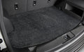 Car trunk with a gray cargo mat