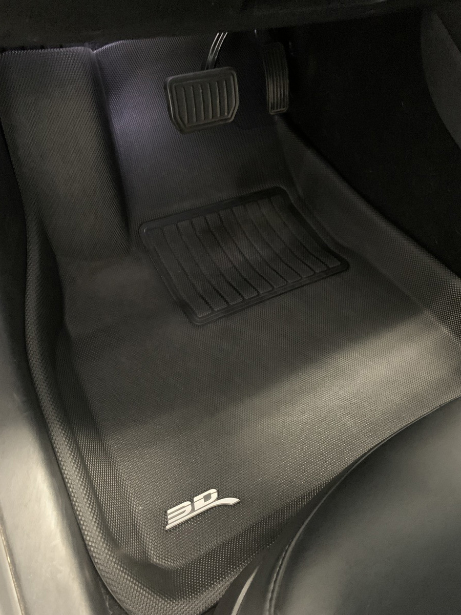 Our review of Tesla floor mats installed back in vehicle