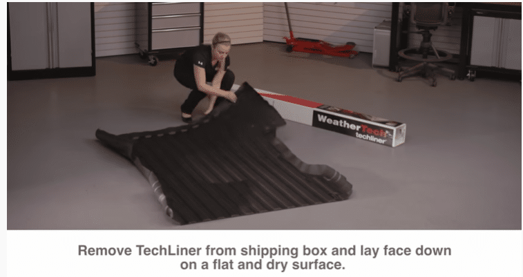 Woman laying the TechLiner on a flat surface